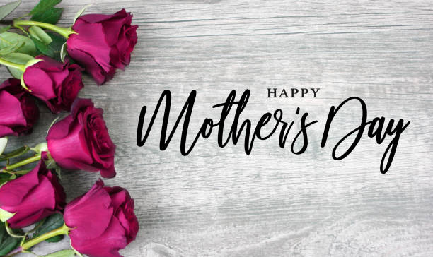 Happy Mother's Day Typography with Bright Pink Roses Over Wood Background